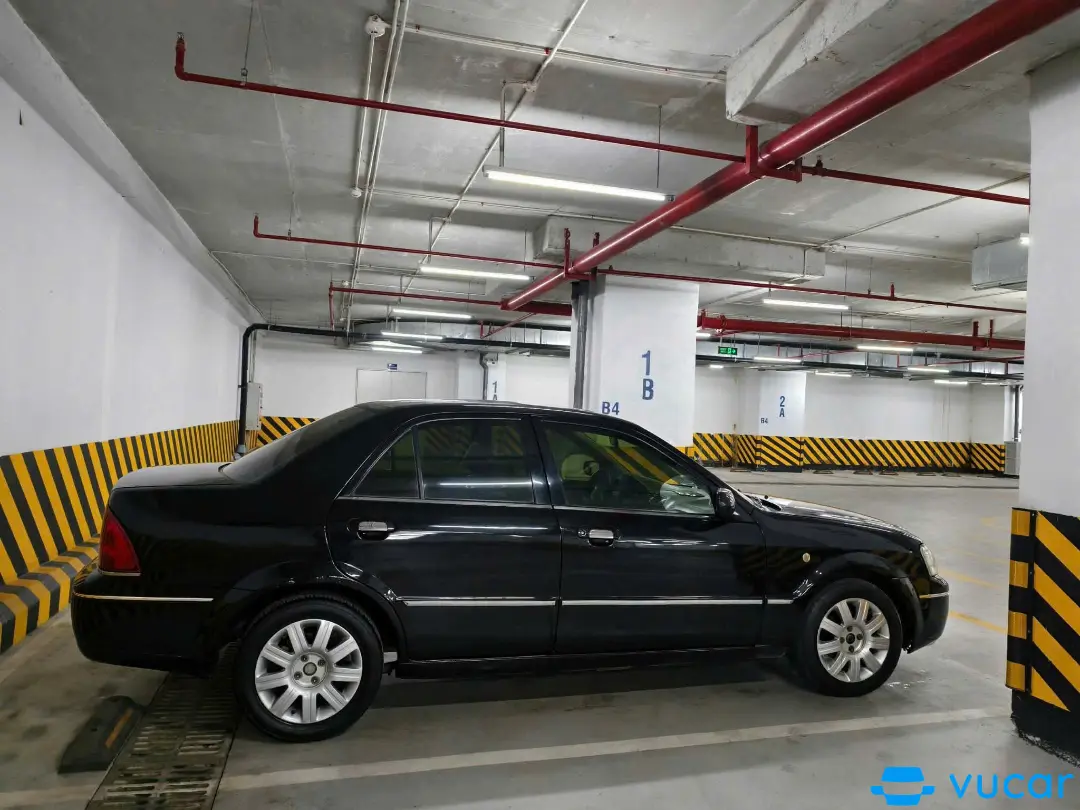 Ford Laser GHIA 1.8 AT 2004 - Ngoại thất 2