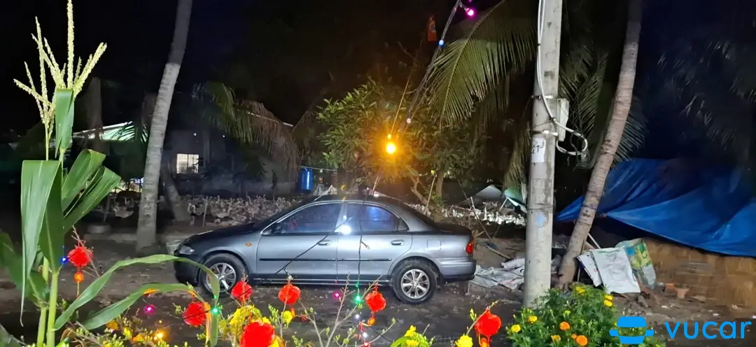 Mazda 323 1.6 MT 1997 - Khoang động cơ 1